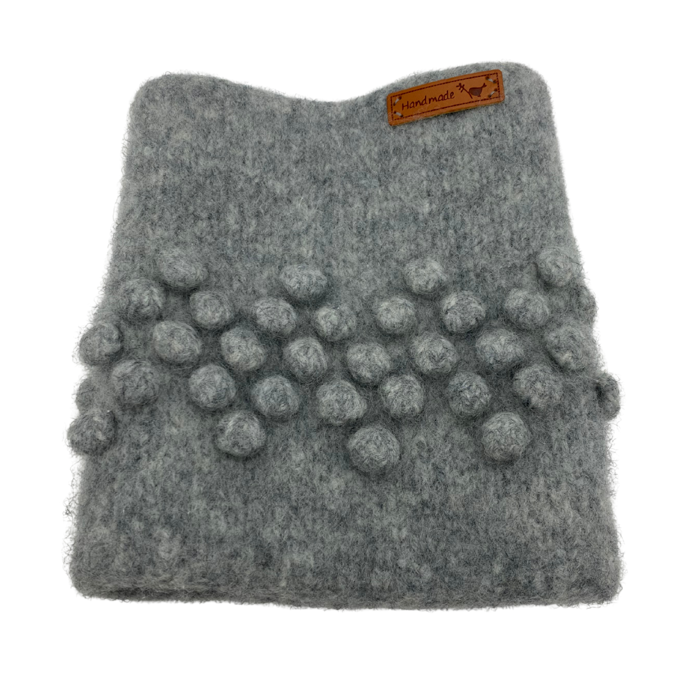 Fjæraveien Tova tennbrikettskjuler strikkeoppskrift