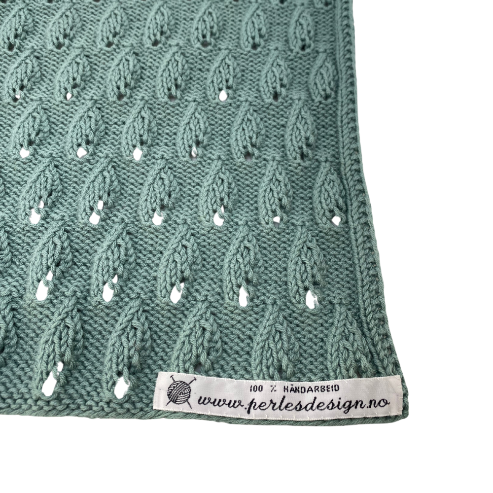 Håndkle med bladmotiv