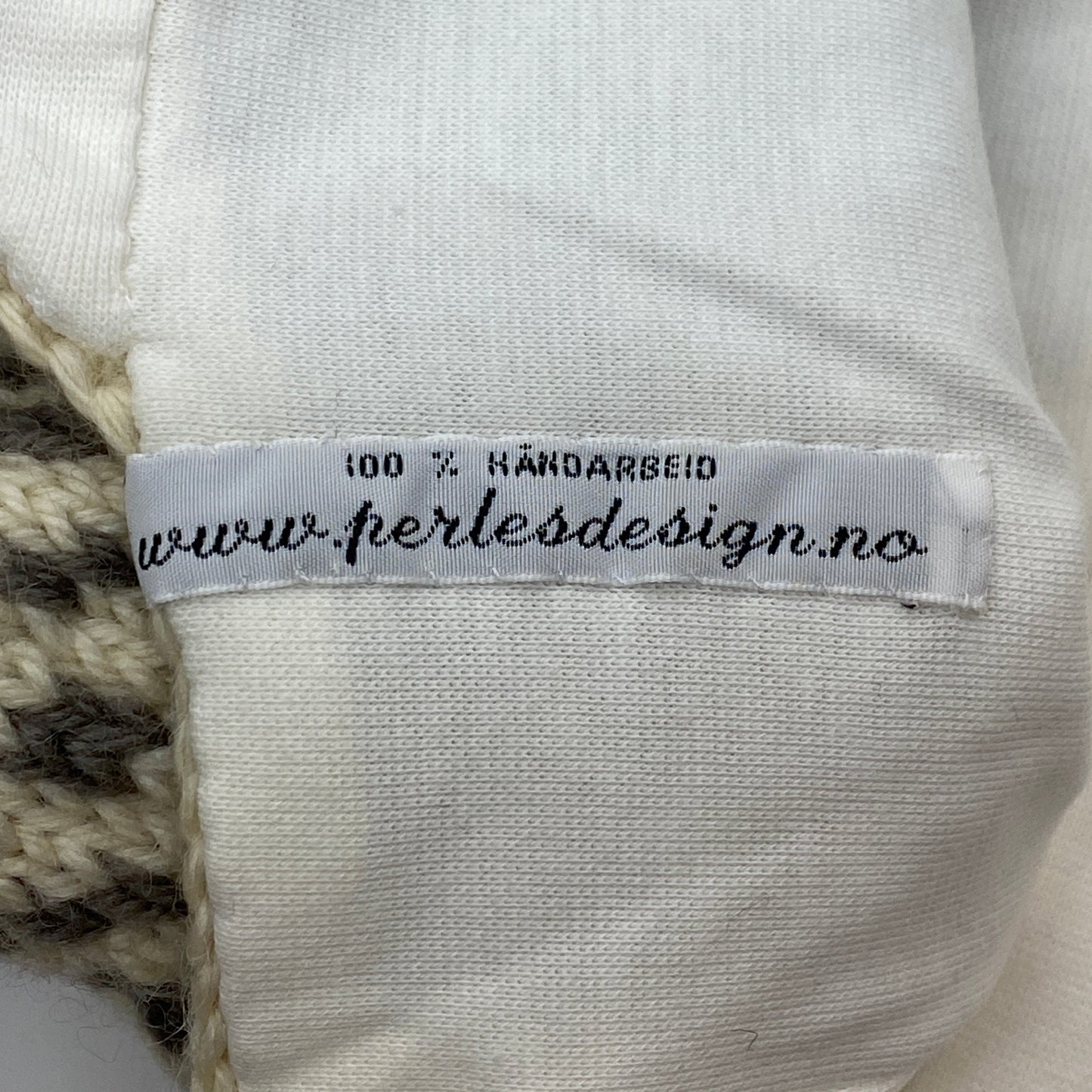 Lue med islender-mønster og øreklaffer til herre str S